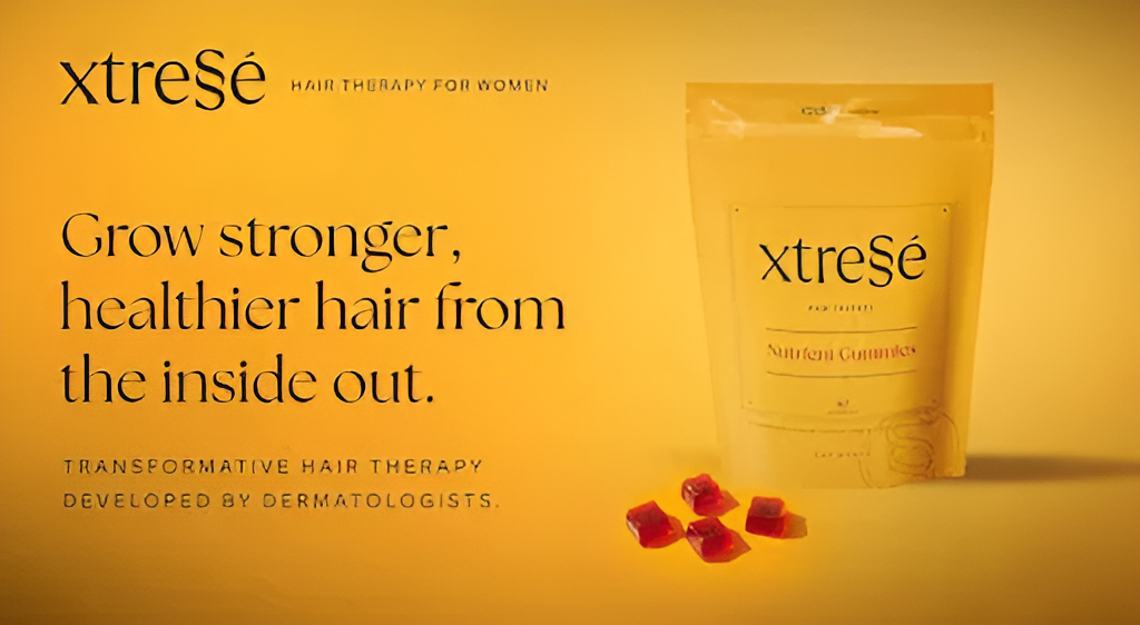 Packaging of Xtresm hair therapy for women with rose petals around.